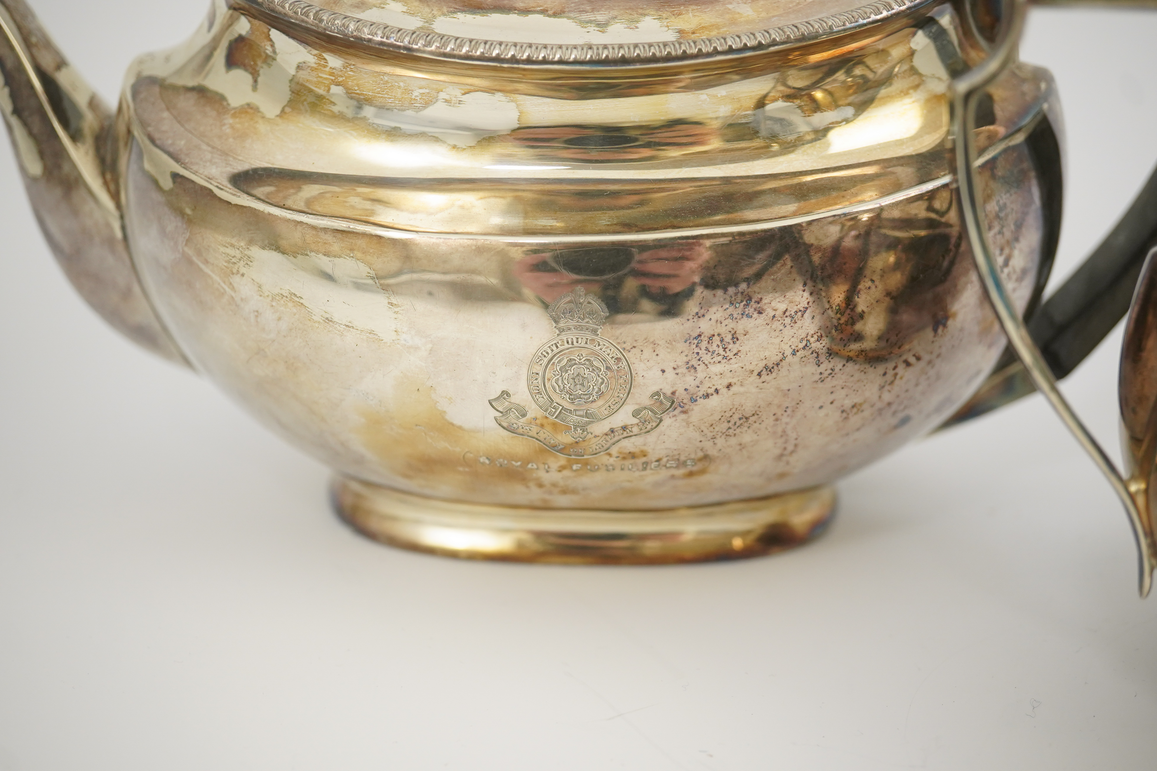 An Edwardian silver teapot and a matching sugar bowl, with engraved inscription, relating to the Royal Fusiliers, by Atkin Brothers